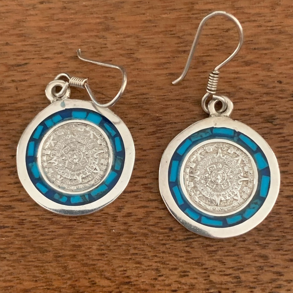 Silver earrings with blue.